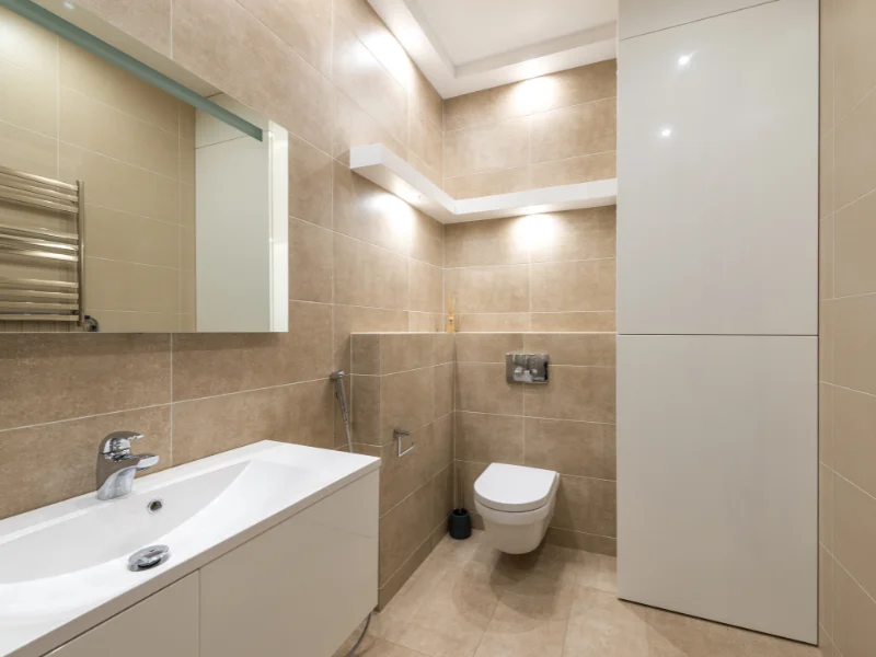 A bathroom in Waterdown featuring recessed LED lighting, energy-efficient fixtures, and a sleek floating vanity.